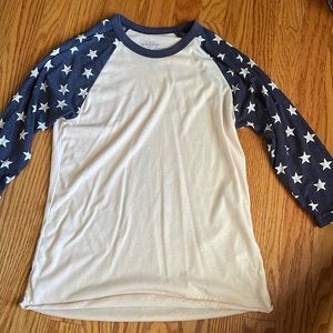boutique Crazy Train 3/4 length tee. Cream with Heathered navy and star sleeves.